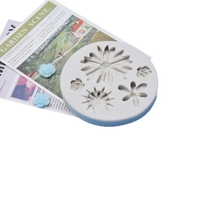 Daisy and rose flower silicone mold for fondant DIY with finished resin flower samples