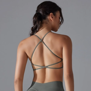Seamless backless yoga set with moss green cross-strap sports bra and high waist leggings
