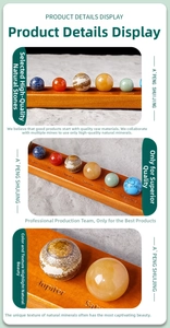 Detailed solar system model with natural crystal planets on a carved wooden base