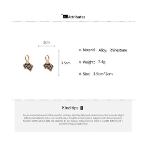 Size chart showing dimensions 3.5cm by 2cm for geometric rhinestone hoop earrings
