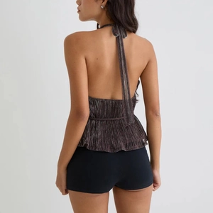 Metallic halter top with backless tie-up design and pleated shimmering texture