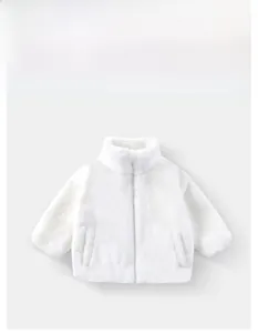 Detail view of white faux fur kids jacket showing stand collar and soft plush texture