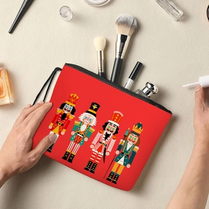Red Nutcracker soldier makeup bag with zipper showing various beauty tools inside