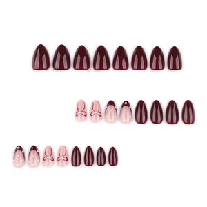 Faux ongles amande bordeaux minimalistes avec nœuds rouges, perles et design french