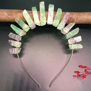 Detail of bohemian crystal headband with green and purple raw fluorite stones