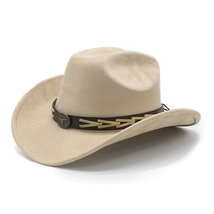 Detail of beige suede cowboy hat with brown leather band and bull head metal badge