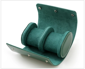 Macro shot of green leather watch roll interior with a soft removable velvet cushion