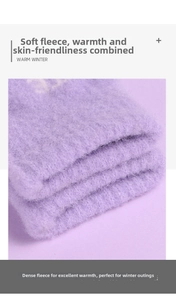 Detailed view of soft purple faux fur material on plush winter knitted gloves