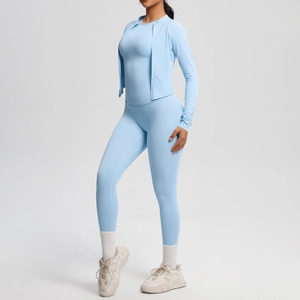 Three-piece sky blue yoga set with a slim-fit jacket, sports bra, and high-waisted leggings