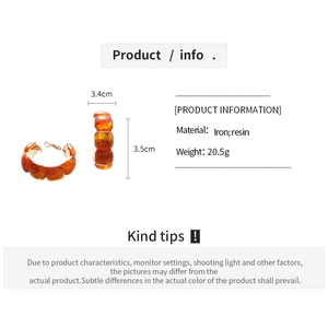 Detailed spec sheet showing size 3.4x3.5cm and material info for amber resin hoop earrings
