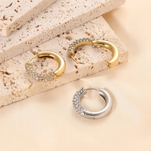 Polished 14K gold and silver stainless steel C-shaped hoop earrings with sparkling cubic zirconia