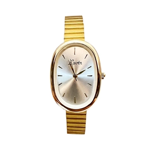 Elegant gold vintage style women's quartz watch with oval dial and metallic stretch band
