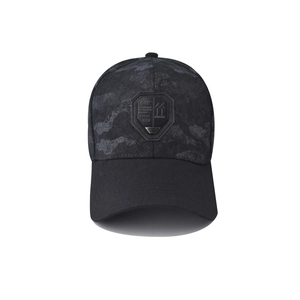 Detailed close-up of a dark camouflage baseball cap featuring a 3D shield rubber patch