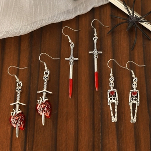 Gothic silver earrings with skeletal, sword heart, and blade designs for Halloween
