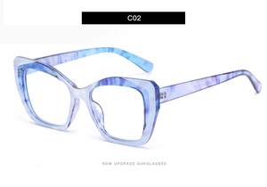 Detail view of TR90 square eyeglass frame with blue marble pattern and metal hinges