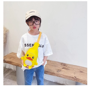 Close-up of yellow cartoon duck kids chest bag in canvas with durable zipper detail