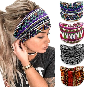 Detailed view of model wearing a purple geometric headband with multiple boho patterns