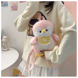 Close-up of pink and white plush penguin backpack with floral bib and soft straps