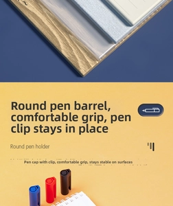 Detail of round marker pens with pocket clips in black, red, and blue ink colors