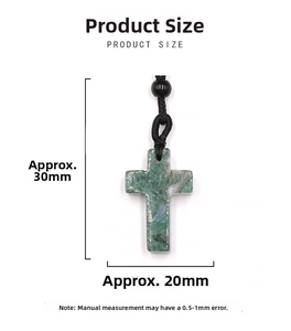 Detail view of natural moss agate cross pendant with size dimensions 30mm by 20mm