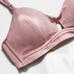 Minimalist dusty pink ribbed seamless bralette with thin straps for women's comfort