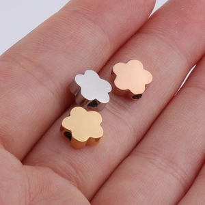 Mirror polished stainless steel flower beads in silver, gold, and rose gold finishes