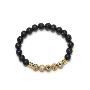 Ethnic beaded bracelet with black volcanic stones and colorful synthetic beads