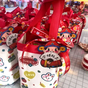 Canvas gift bag with red handle and cartoon rabbit for school graduation ceremony
