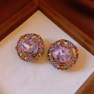 Boucles d'oreilles vintage en or avec cristal violet et petits diamants orange