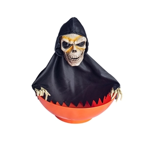 Animated Halloween skull bowl with glowing eyes and moving hands for party decorations