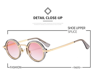 Detail of retro round punk sunglasses with gold metal temples and pink gradient lenses