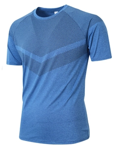 Macro view of blue moisture-wicking fabric with black geometric pattern on men's tee