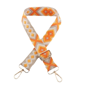 Adjustable geometric patterned bag strap with orange diamond weave and gold metal hooks