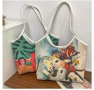 Detail of oil painting canvas tote bag featuring colorful artistic portrait patterns