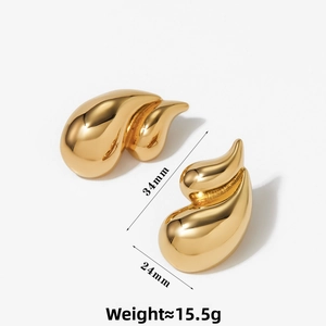 Detail view of geometric teardrop earrings showing 34mm length and 24mm width dimensions