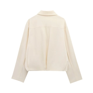 Back view of a cream minimalist lapel baseball jacket with long sleeves and seam details