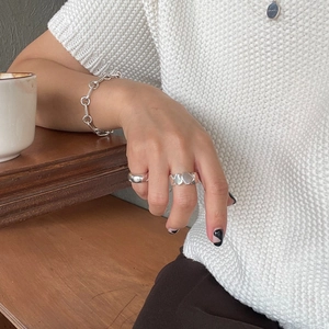 Elegant 925 sterling silver jewelry set featuring irregular ring, necklace and bracelet