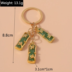 Detailed view of bamboo joint keychain with dimensions and weight measurements