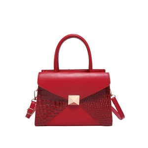 Fashionable red crocodile pattern patchwork handbag with gold buckle and top handle
