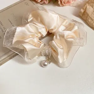 Elegant beige satin and organza scrunchie with crystal beads and a large pearl pendant