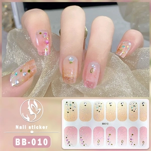 Detailed macro view of BB-010 5D gel nail stickers with orange-pink gradients and fine glitter