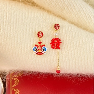 Asymmetric lion dance earrings in red and gold finish with Chinese character charms