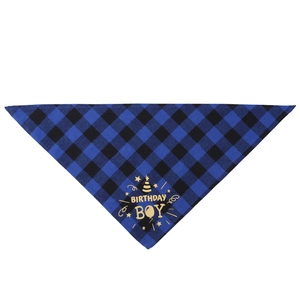 Close-up of blue and black plaid birthday dog bandana with golden Birthday Boy print