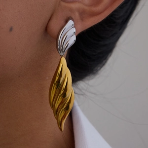 Boucles d'oreilles bicolores en acier inoxydable doré 18 carats et argenté à motif ailé