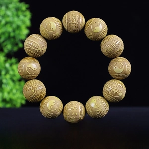 Macro di grani in bosso da 20mm con incisioni Tai Chi e segni zodiacali