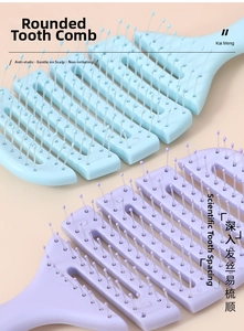 Detail of blue and purple vented hair brushes with rounded anti-static massage bristles