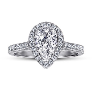 Close-up of pear-cut moissanite ring in 925 sterling silver with halo setting