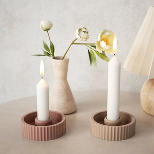 Detailed view of striped resin candle holder molds with smooth inner surfaces for DIY crafts