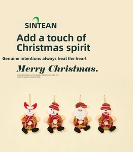 Close-up of four plush Christmas ornaments featuring Santa, snowman, elk and polar bear