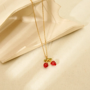 Gold stainless steel necklace with red enamel cherry pendant and fine link chain
